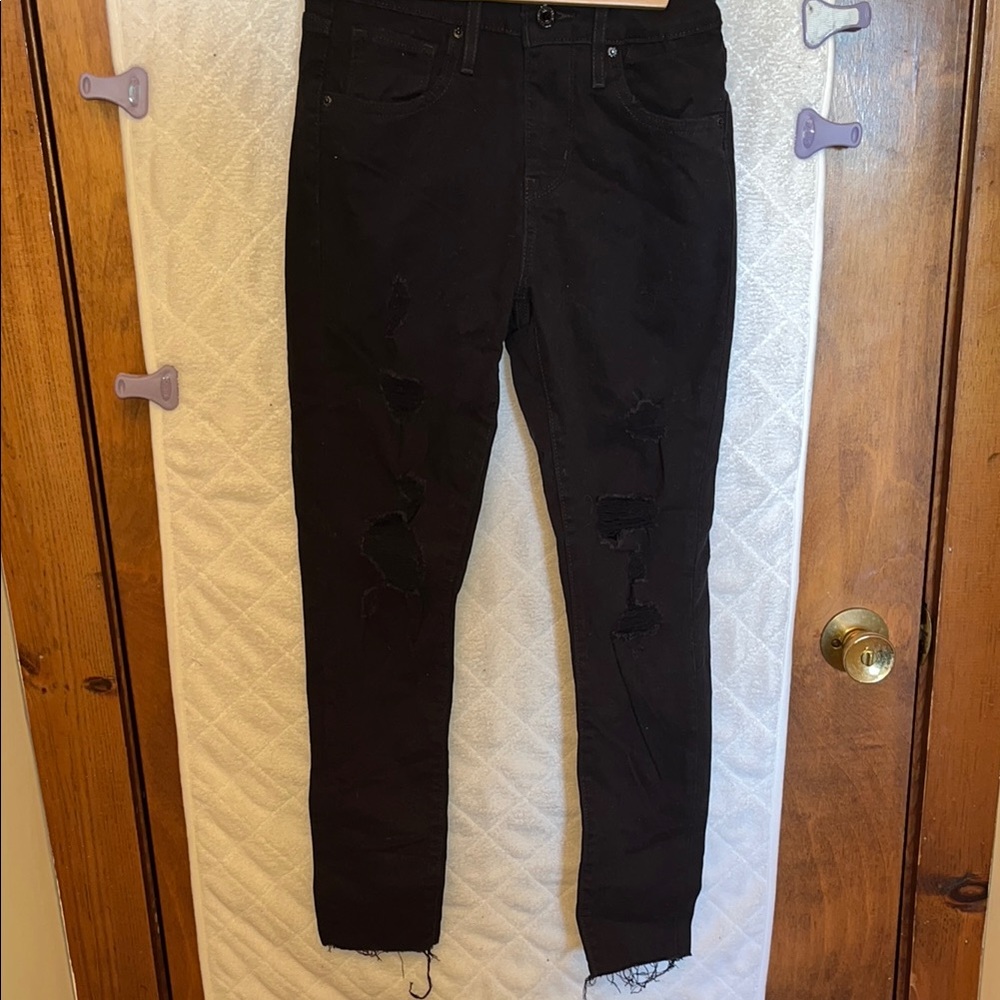 Levi’s 721 Black Distressed High Rise Skinny Jeans